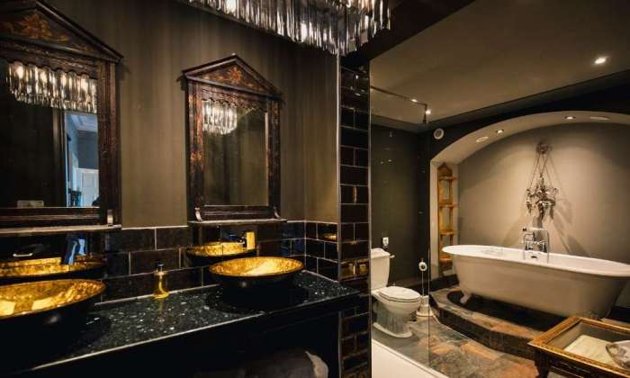 Gold and black bathroom decor